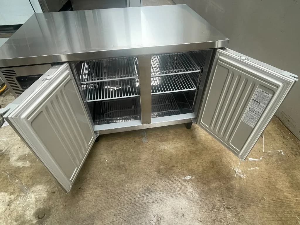 Interior cooling racks and chamber of Hoshizaki commercial undercounter refrigerator cleared in Singapore